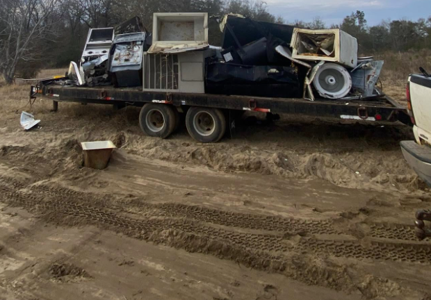 Debris haul-off loaded on trailer